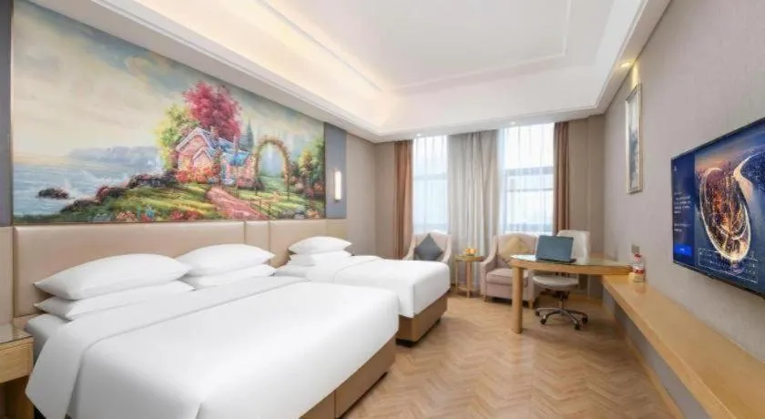 Bed in Vienna Hotel Jiangsu Zhangjiagang Passenger Terminal Station