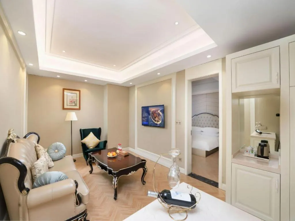 Bed in Vienna Hotel Jiangsu Zhangjiagang Passenger Terminal Station