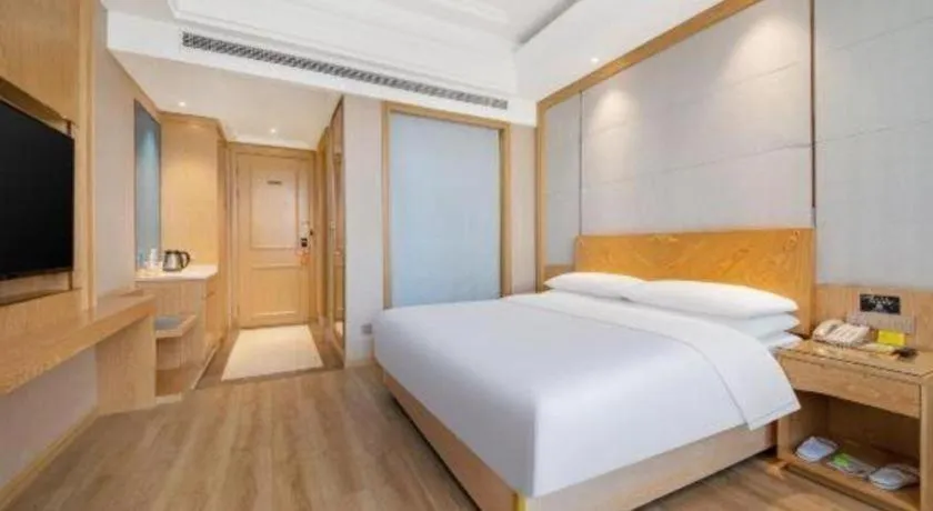 Bed in Vienna Hotel Jiangsu Kunshan Qiandeng Town