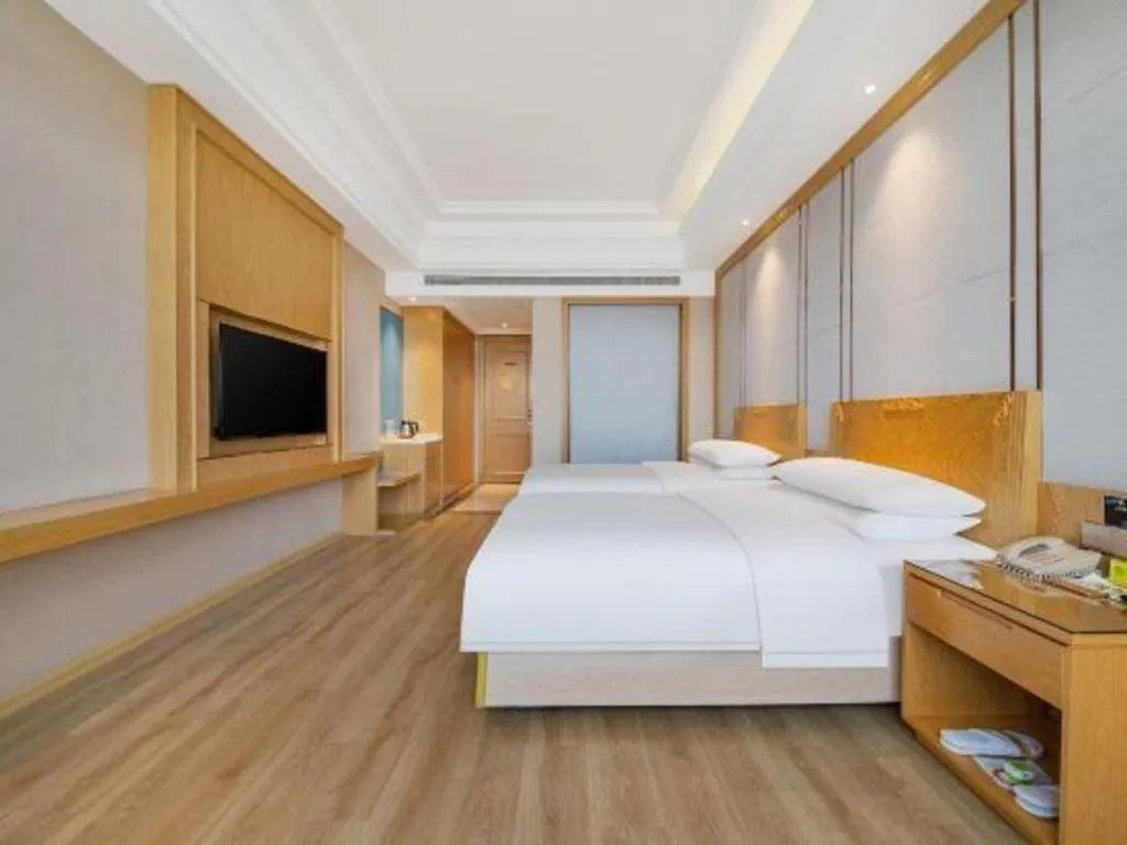Bed in Vienna Hotel Jiangsu Kunshan Qiandeng Town