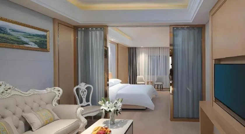 Bed in Vienna Hotel Jiangsu Kunshan Qiandeng Town