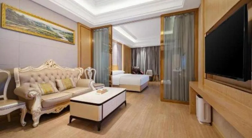 Bed in Vienna Hotel Jiangsu Kunshan Qiandeng Town