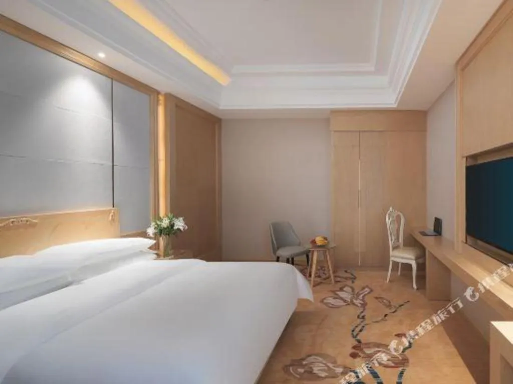 Bed in Vienna Hotel Jiangsu Kunshan Qiandeng Town