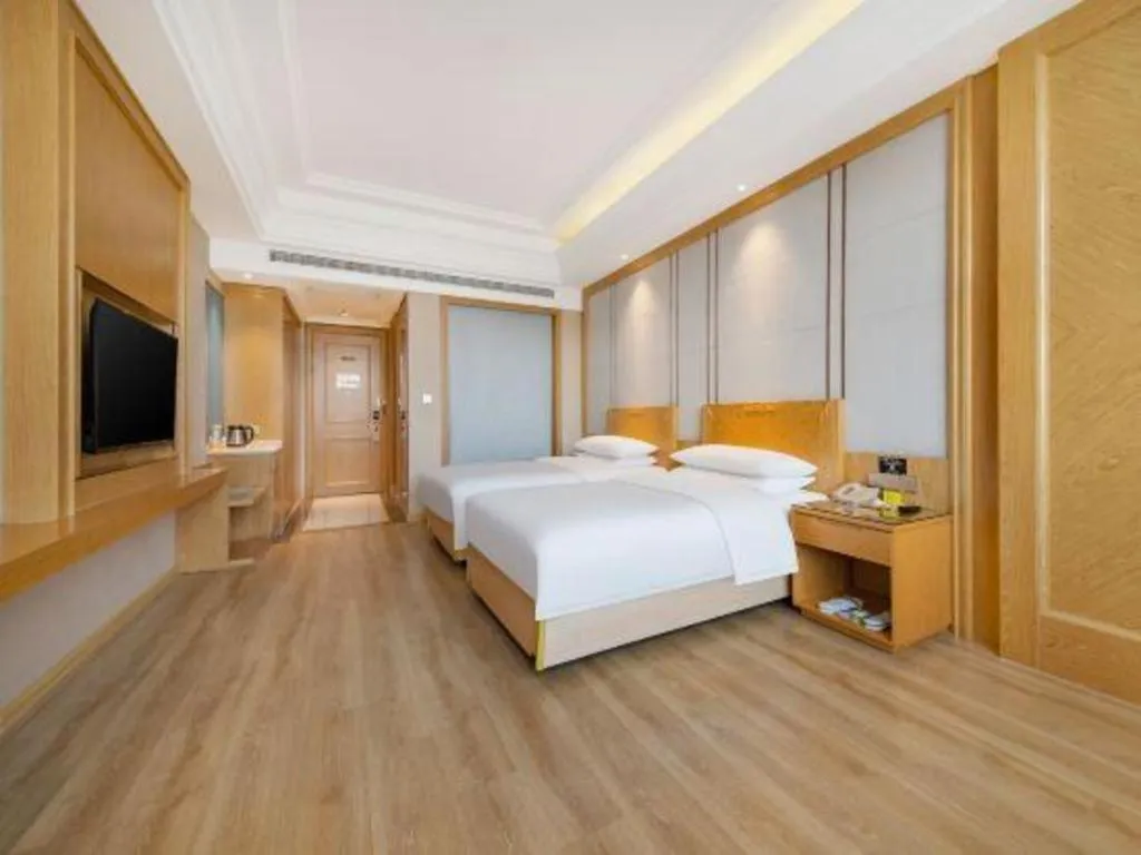 Bed in Vienna Hotel Jiangsu Kunshan Qiandeng Town