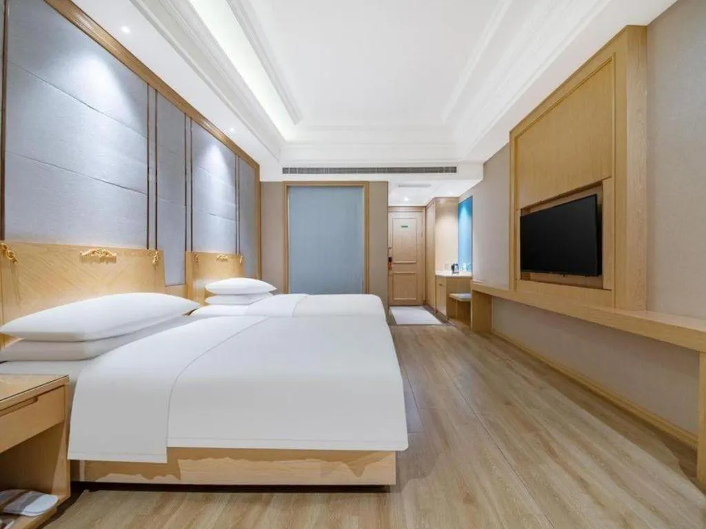 Bed in Vienna Hotel Jiangsu Kunshan Qiandeng Town