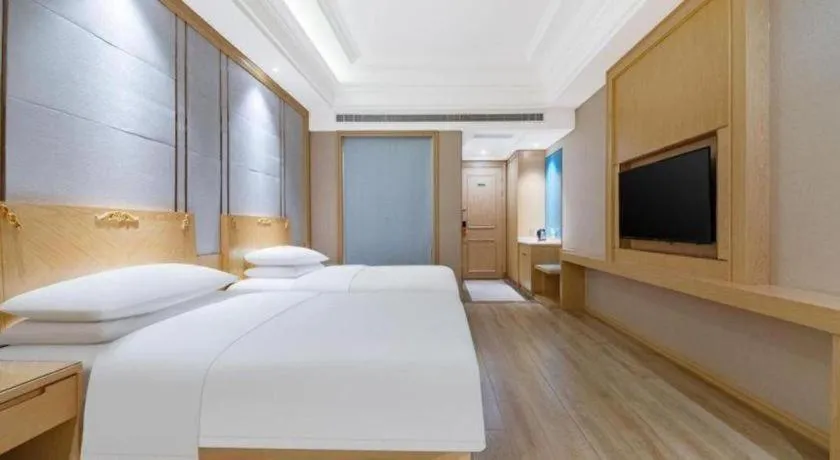 Bed in Vienna Hotel Jiangsu Kunshan Qiandeng Town