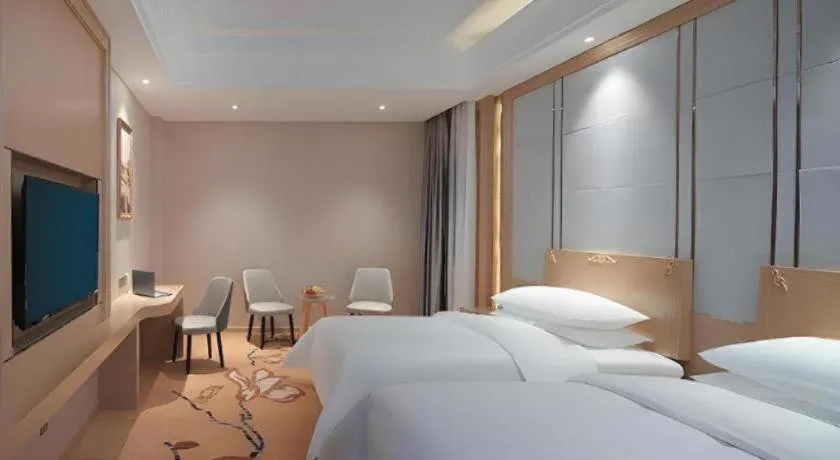 Bed in Vienna Hotel Jiangsu Kunshan Qiandeng Town