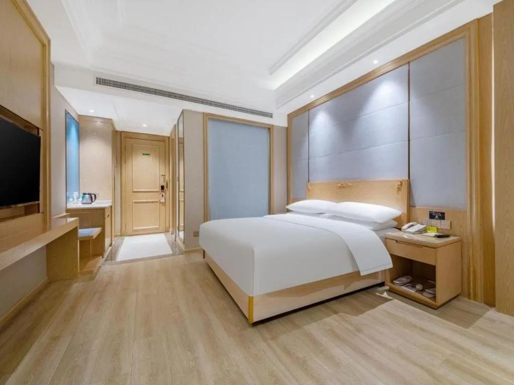 Bed in Vienna Hotel Jiangsu Kunshan Qiandeng Town