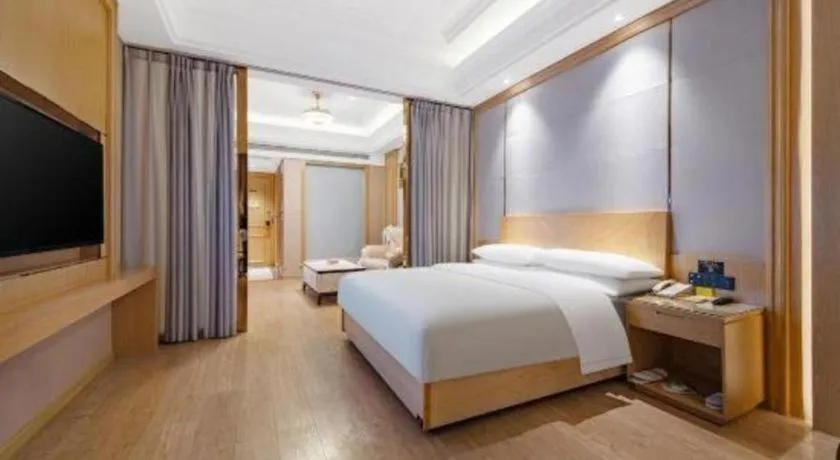 Bed in Vienna Hotel Jiangsu Kunshan Qiandeng Town