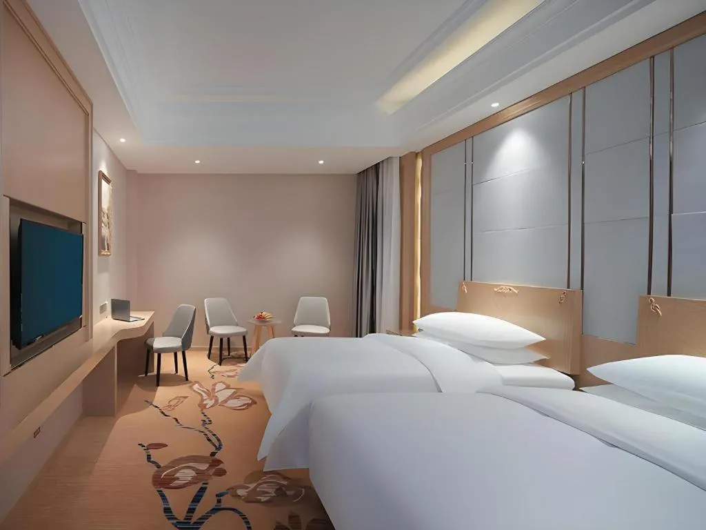 Bed in Vienna Hotel Jiangsu Kunshan Qiandeng Town