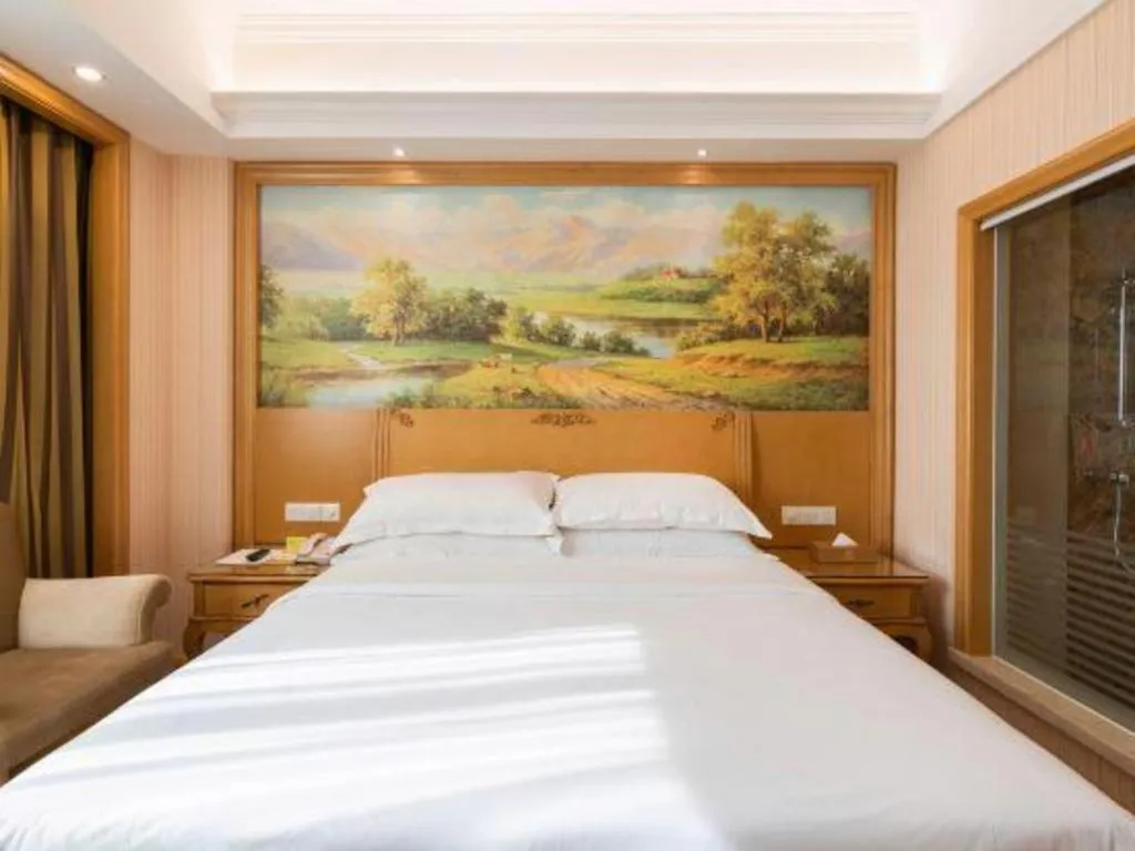 Bed in Vienna Hotel Guangzhou Huadu Sunac Cultural Tourism City Shiling