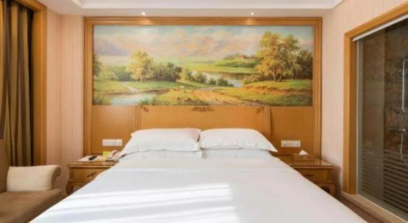 Bed in Vienna Hotel Guangzhou Huadu Sunac Cultural Tourism City Shiling