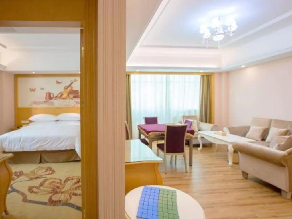Bed in Vienna Hotel Guangzhou Huadu Sunac Cultural Tourism City Shiling
