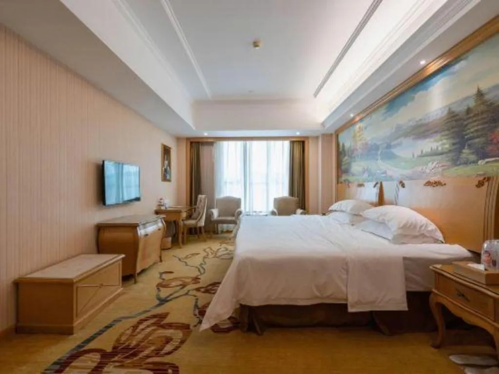 Bed in Vienna Hotel Guangzhou Huadu Sunac Cultural Tourism City Shiling
