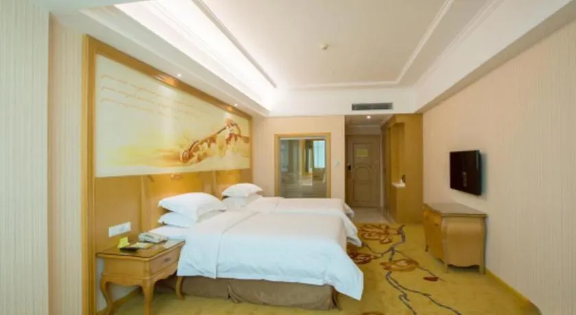 Bed in Vienna Hotel Guangzhou Huadu Sunac Cultural Tourism City Shiling
