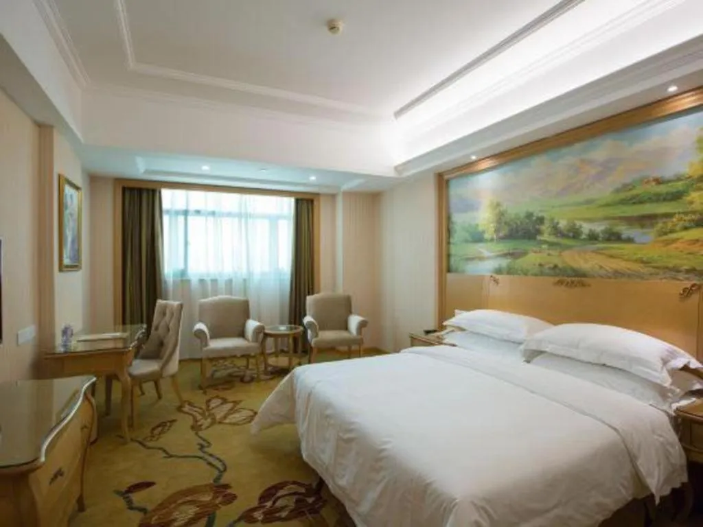 Bed in Vienna Hotel Guangzhou Huadu Sunac Cultural Tourism City Shiling