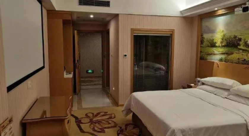 Bed in Vienna Hotel Guangzhou Huadu Sunac Cultural Tourism City Shiling