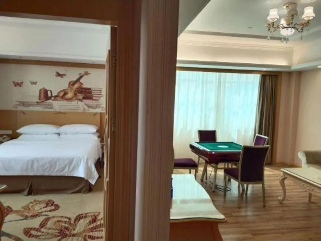 Bed in Vienna Hotel Guangzhou Huadu Sunac Cultural Tourism City Shiling