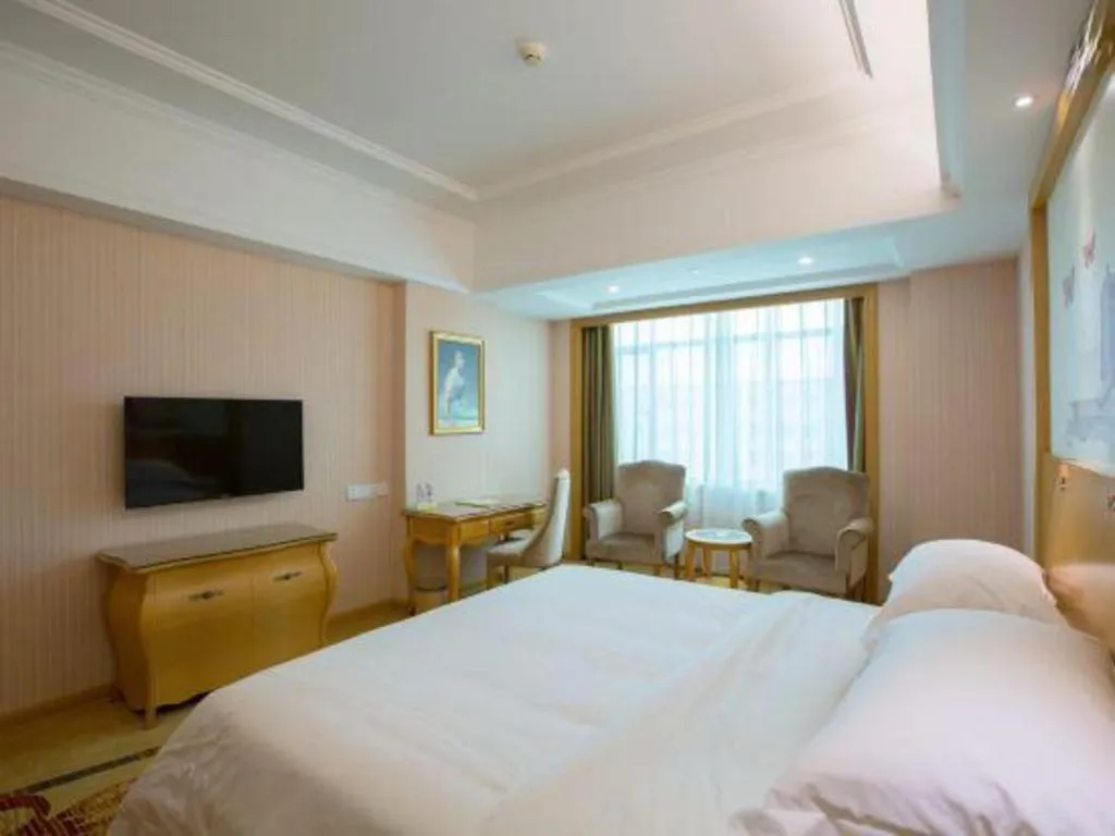 Bed in Vienna Hotel Guangzhou Huadu Sunac Cultural Tourism City Shiling