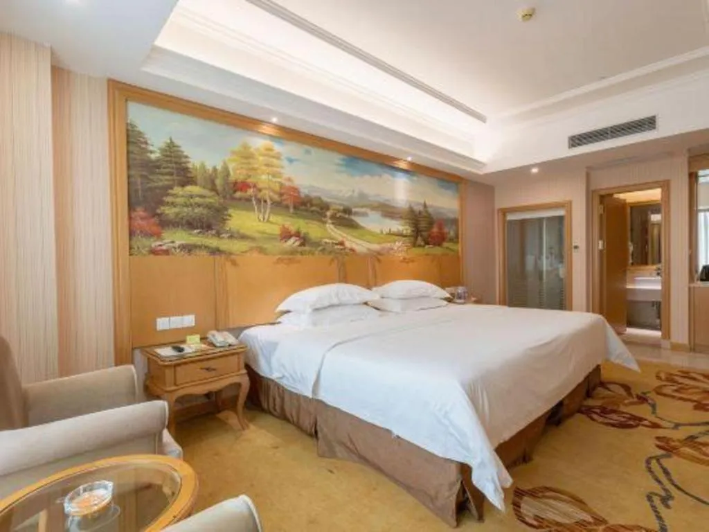 Bed in Vienna Hotel Guangzhou Huadu Sunac Cultural Tourism City Shiling