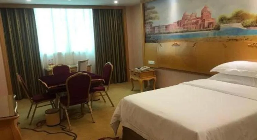 Bed in Vienna Hotel Guangzhou Huadu Sunac Cultural Tourism City Shiling