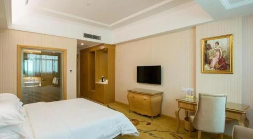 Bed in Vienna Hotel Guangzhou Huadu Sunac Cultural Tourism City Shiling