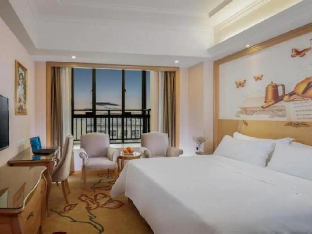 Bed in Vienna Hotel Guangzhou Huadu Sunac Cultural Tourism City Shiling