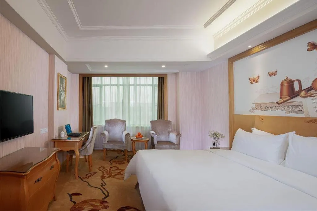Bed in Vienna Hotel Guangzhou Huadu Sunac Cultural Tourism City Shiling