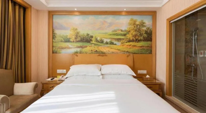 Bed in Vienna Hotel Guangzhou Huadu Sunac Cultural Tourism City Shiling