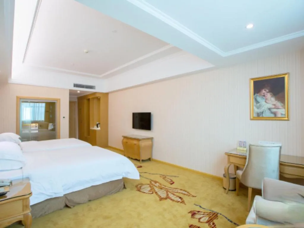 Bed in Vienna Hotel Guangzhou Huadu Sunac Cultural Tourism City Shiling