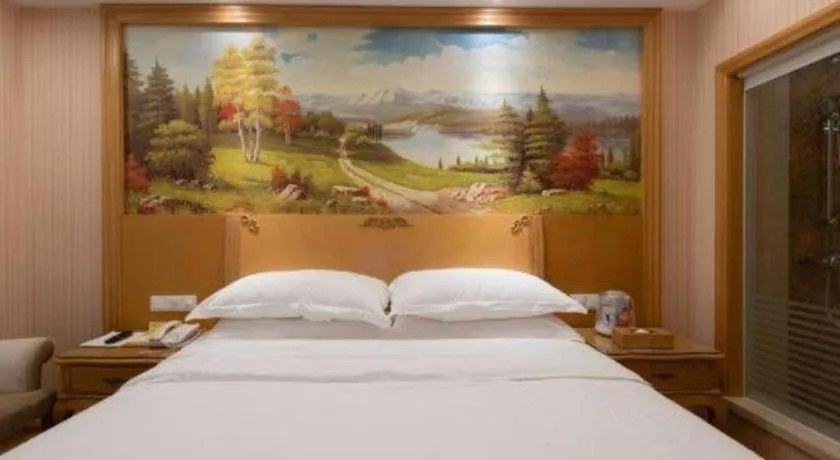 Bed in Vienna Hotel Guangzhou Huadu Sunac Cultural Tourism City Shiling