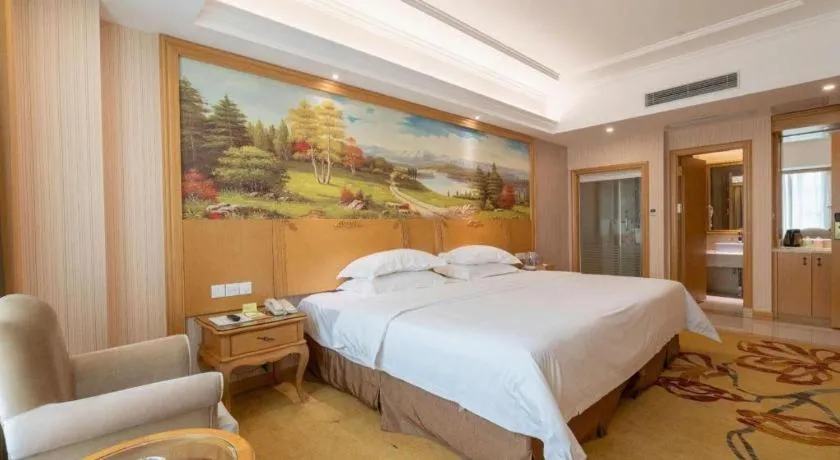 Bed in Vienna Hotel Guangzhou Huadu Sunac Cultural Tourism City Shiling