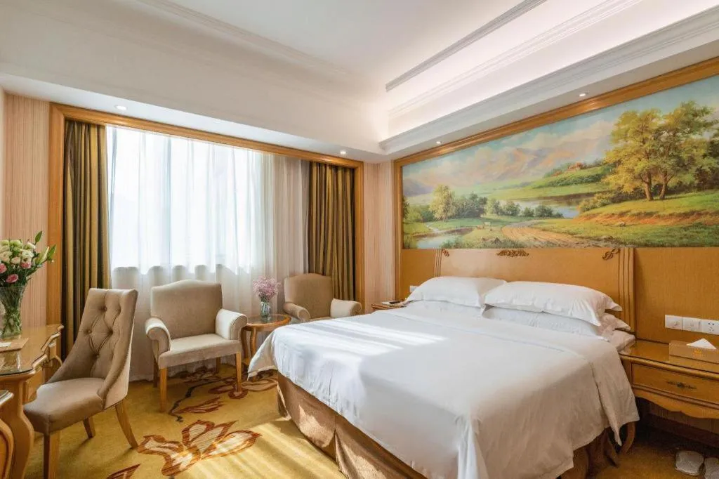 Bed in Vienna Hotel Guangzhou Huadu Sunac Cultural Tourism City Shiling