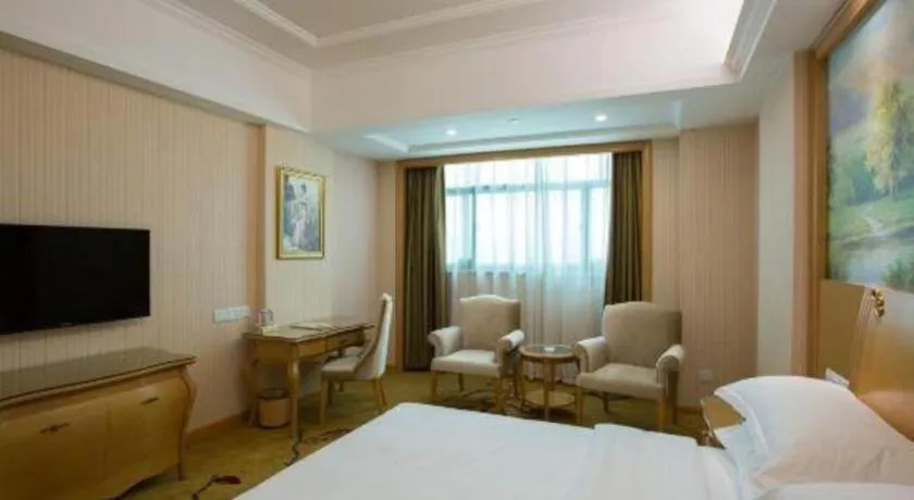 Bed in Vienna Hotel Guangzhou Huadu Sunac Cultural Tourism City Shiling