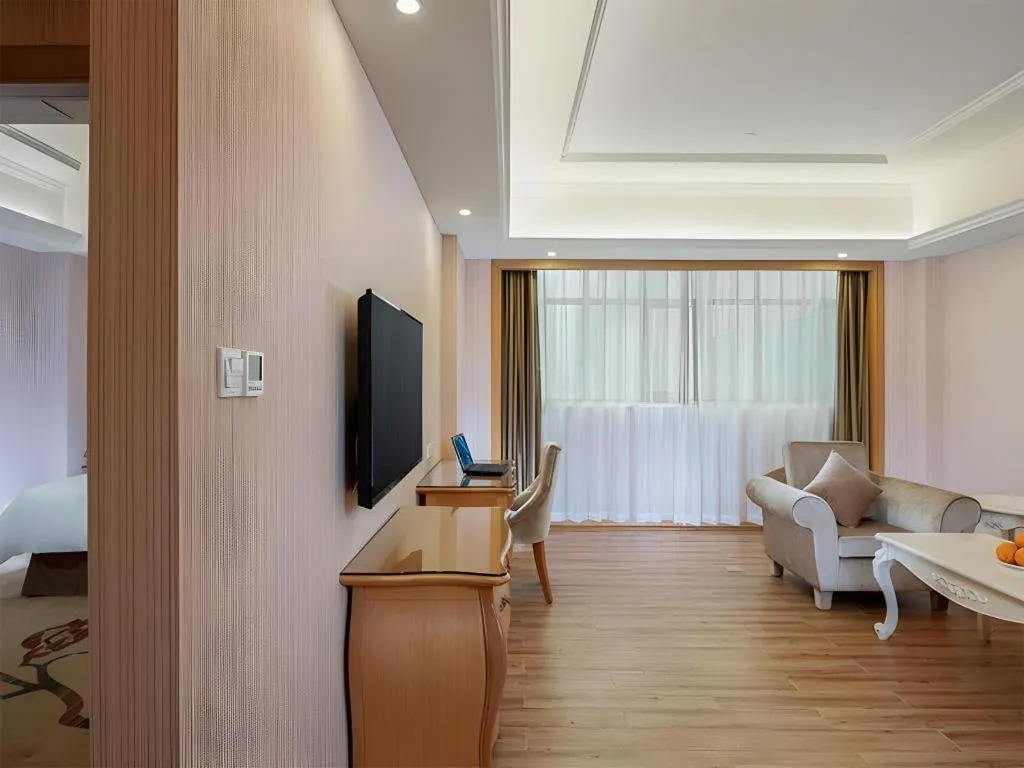 Bed in Vienna Hotel Guangzhou Huadu Sunac Cultural Tourism City Shiling