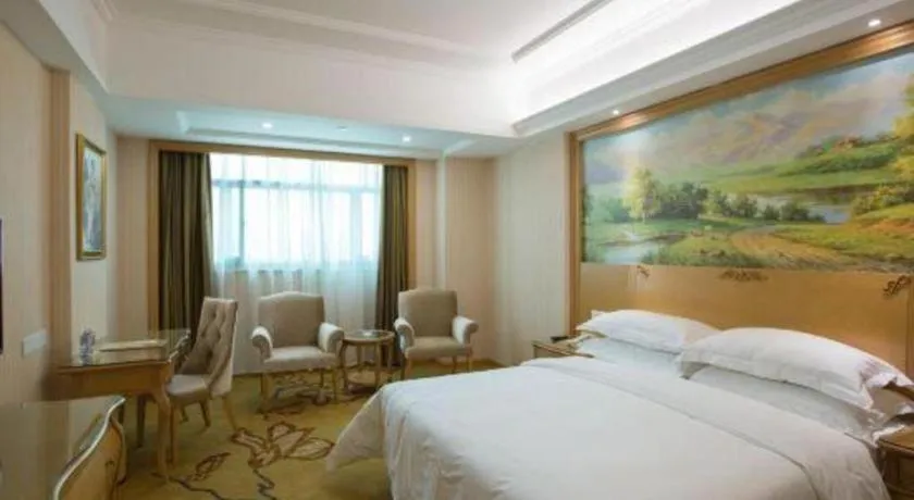 Bed in Vienna Hotel Guangzhou Huadu Sunac Cultural Tourism City Shiling