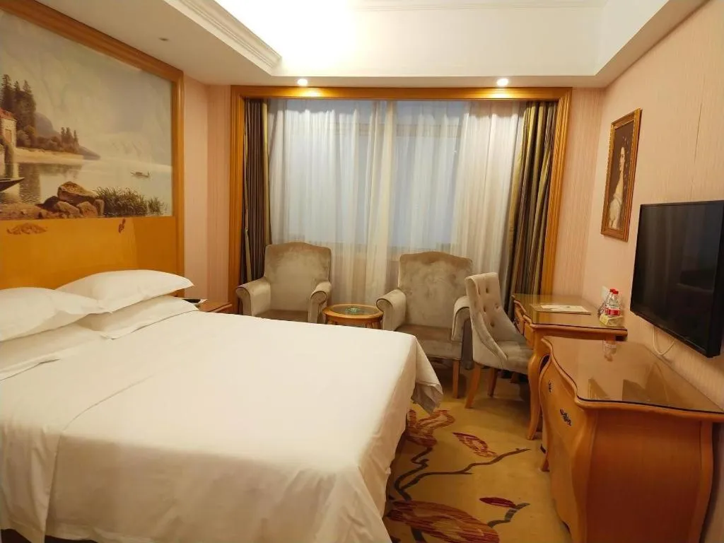 Bed in Vienna Hotel Guangzhou Huadu Sunac Cultural Tourism City Shiling