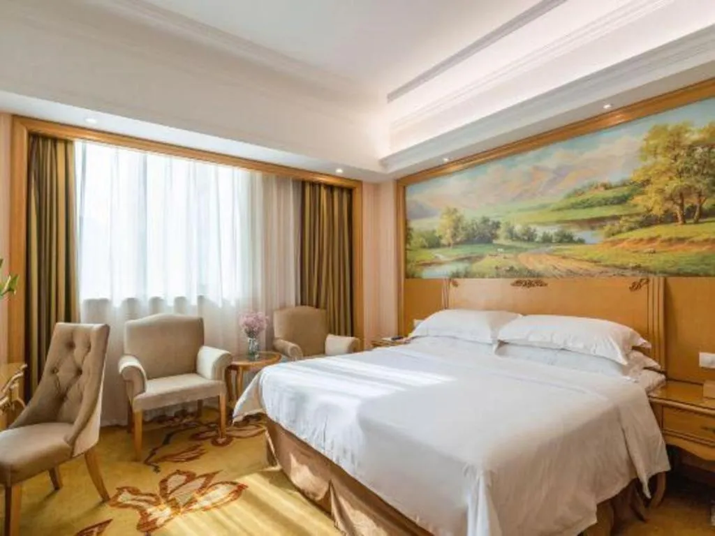 Bed in Vienna Hotel Guangzhou Huadu Sunac Cultural Tourism City Shiling