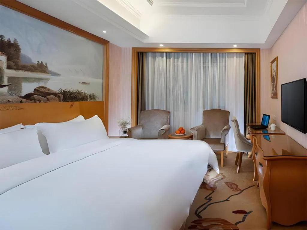 Bed in Vienna Hotel Guangzhou Huadu Sunac Cultural Tourism City Shiling