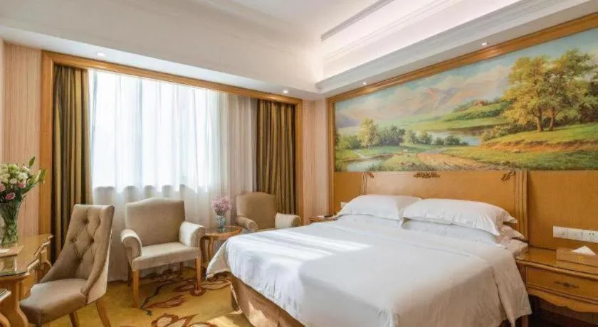 Bed in Vienna Hotel Guangzhou Huadu Sunac Cultural Tourism City Shiling