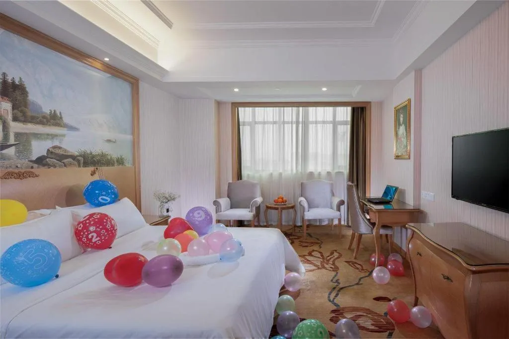 Bed in Vienna Hotel Guangzhou Huadu Sunac Cultural Tourism City Shiling