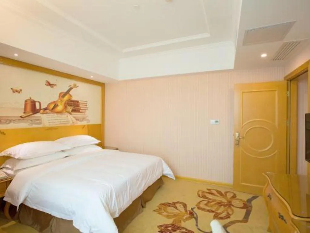Bed in Vienna Hotel Guangzhou Huadu Sunac Cultural Tourism City Shiling