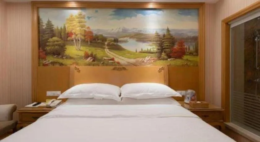 Bed in Vienna Hotel Guangzhou Huadu Sunac Cultural Tourism City Shiling