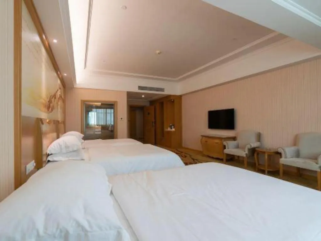 Bed in Vienna Hotel Guangzhou Huadu Sunac Cultural Tourism City Shiling
