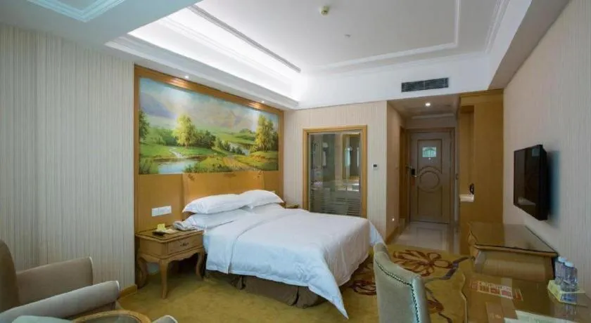 Bed in Vienna Hotel Guangzhou Huadu Sunac Cultural Tourism City Shiling