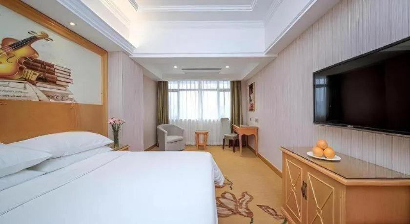 Bed in Vienna Hotel Hubei Xiangyang Tang City Gulou