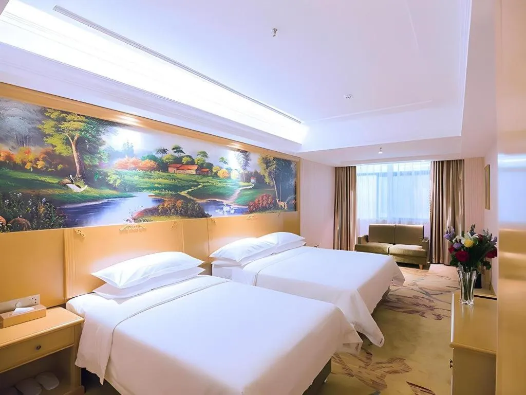 Bed in Vienna Hotel Hubei Xiangyang Tang City Gulou
