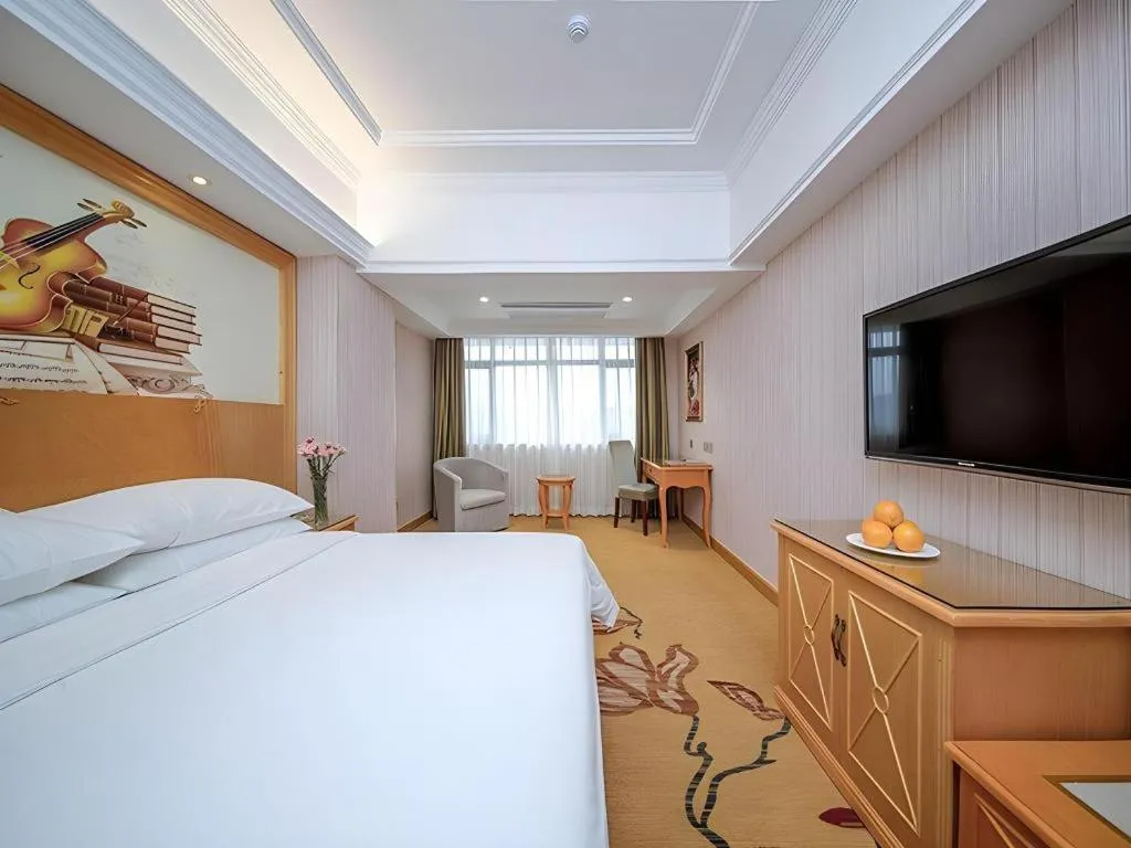 Bed in Vienna Hotel Hubei Xiangyang Tang City Gulou
