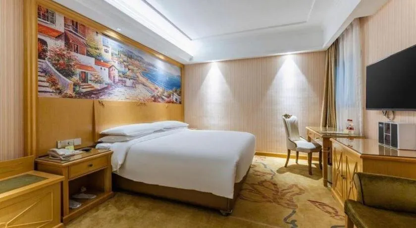 Bed in Vienna Hotel Hubei Xiangyang Tang City Gulou