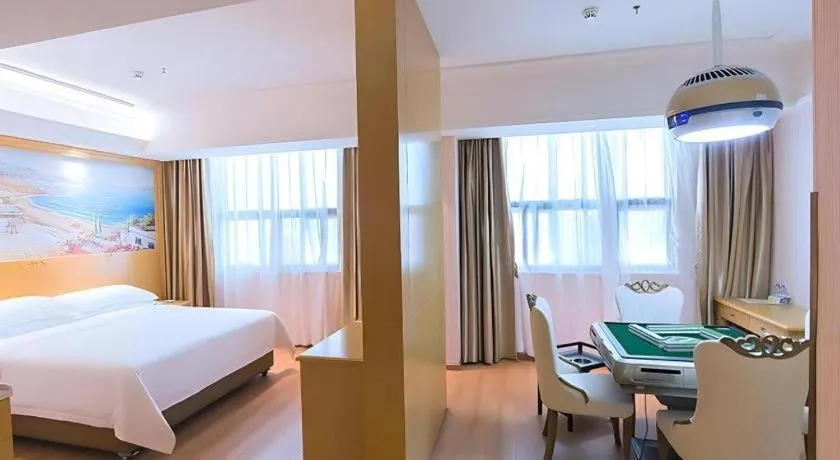 Bed in Vienna Hotel Hubei Xiangyang Tang City Gulou